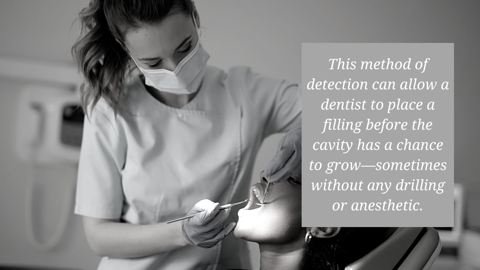 dentist looking for cavities in patient's mouth