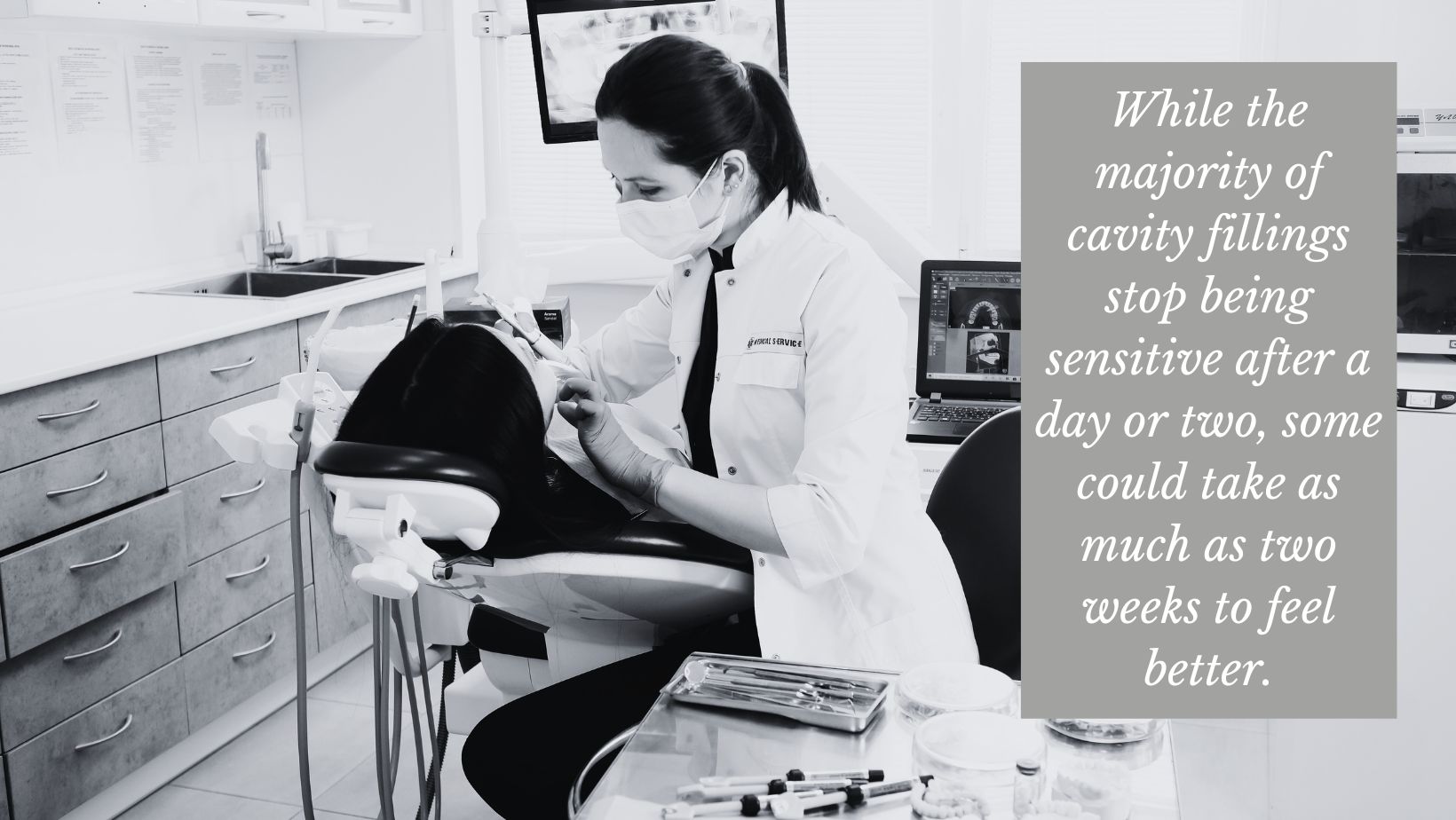 dentist filling a cavity in a dental office