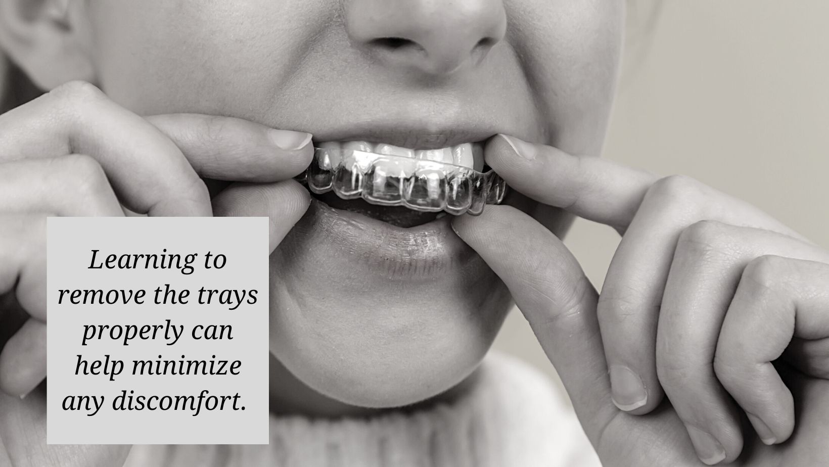 teen easily removing Invisalign from top of mouth