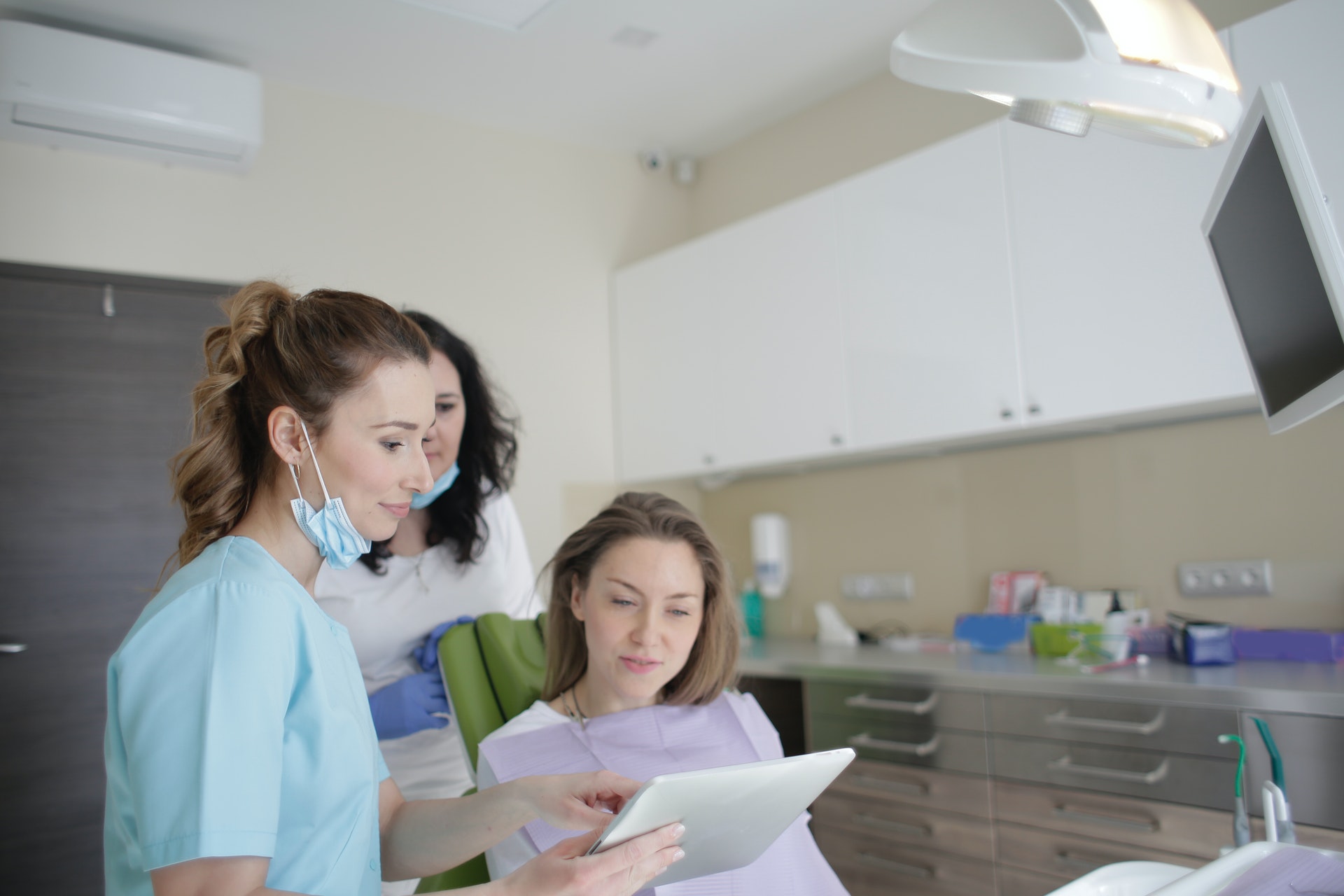 patient discussing invisalign to close gaps