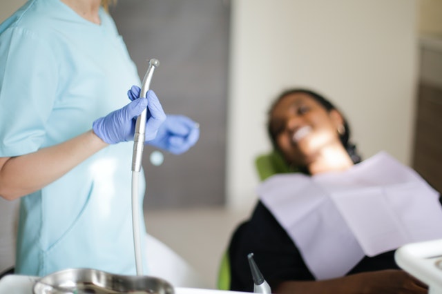 Dentist ready to fill a composite 